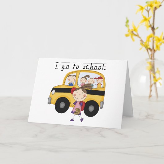 学校のTシャツと贈り物に行く女の子 カード (黄色い花)