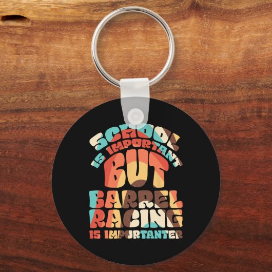 学校は重要だが競走は重要だ キーホルダー (正面)