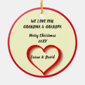 孫がクリスマスに人生のグランド写真を撮る セラミックオーナメント (裏面)