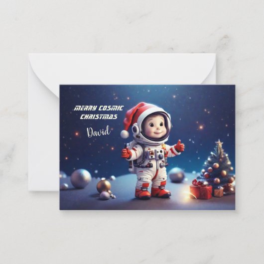 宇宙でのクリスマスを祝うかわいい宇宙飛行士の少年 ノートカード (正面)