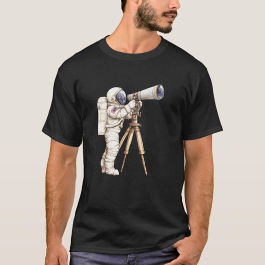 宇宙で望遠鏡を使って星を眺める宇宙飛行士 Tシャツ (正面)