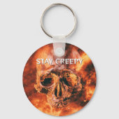 宇宙で炎に包まれるドクロ、Stay Creepy キーホルダー (裏面)