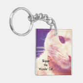 宇宙で猫疑問に思をスキップする キーホルダー (正面左)