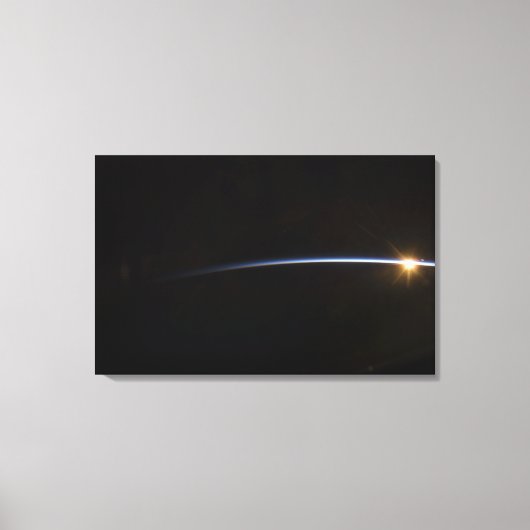 宇宙で表示される日の出 キャンバスプリント (正面)