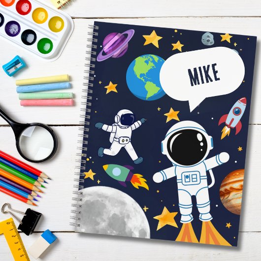 宇宙の宇宙飛行士、惑星、月、星がかわいい子供 ノートブック