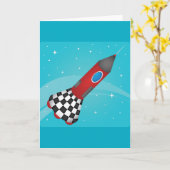 宇宙を飛ぶレトロな赤いロケット カード (黄色い花)