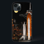宇宙シャトルディスカバリーと月 iPhone 13ケース<br><div class="desc">宇宙シャトルディスカバリーは、フロリダ州ケープカナベラルのケネディ宇宙センターの発射台39Aに位置している。空に満月が満月に近づき、劇的な背景を追加する。</div>