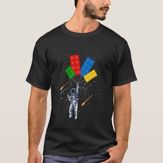 宇宙宇宙飛行士マスタービルダーおもしろい建物ブロック Tシャツ (正面)