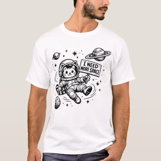 宇宙遊泳中の猫の宇宙飛行士 もっとスペースが欲しい Tシャツ (正面)
