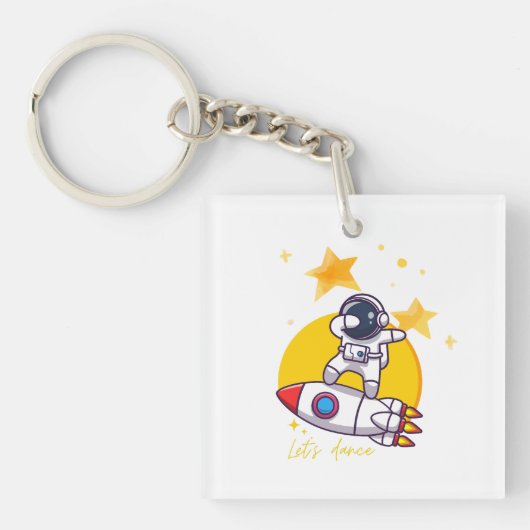 宇宙飛行士がロケットで踊る キーホルダー (正面)
