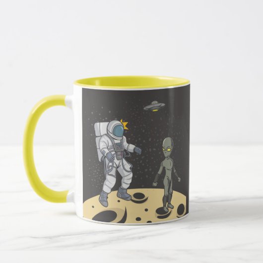宇宙飛行士とエイリアン マグカップ (左)