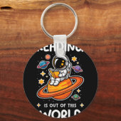 宇宙飛行士の宇宙本 読書はこの世のものではない キーホルダー (正面)