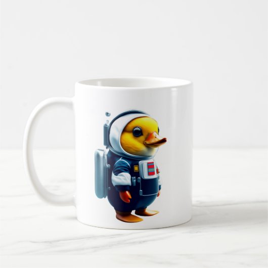 宇宙飛行士の服を着た小さなアヒル コーヒーマグカップ (左)