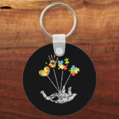 宇宙飛行士パズルの自閉症啓発 キーホルダー (裏面)