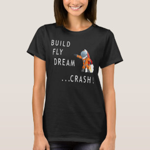 宇宙飛行士宇宙飛んでいるビルドリームクラッシュスペースマン Tシャツ