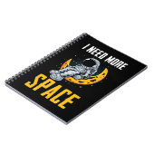 宇宙飛行士座る月の宇宙ユーモア ノートブック (左側)