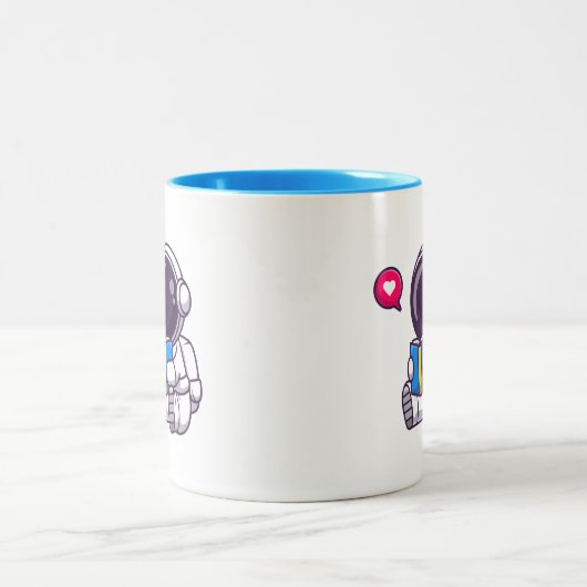 宇宙飛行士読の本かわいい子供 ツートーンマグカップ (中央)