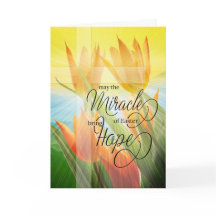 宗教復活祭のチューリップとクロスが希望をもたらす