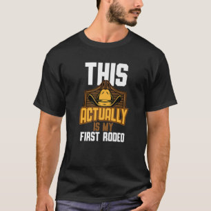 実クールは私の最初のロデオ カウボおもしろいー Tシャツ