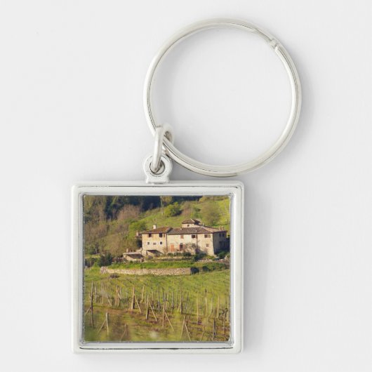 客を受け入れる作業場「アスチュイト」 キーホルダー (正面)