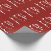 家の上にトナカイを持つサンタのそり ラッピングペーパー (角)