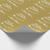 家の上にトナカイを持つサンタのそり ラッピングペーパー (角)