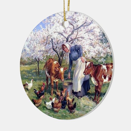 家畜に絵を描くことを食べ物を与えている女の子 セラミックオーナメント (左)