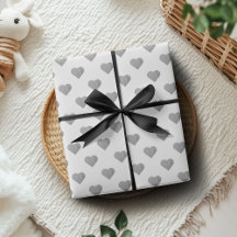 対称の小さなコンクリートグレーハートオン白