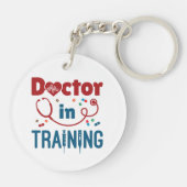 将来の医師の訓練を受けている医師 キーホルダー (裏面)