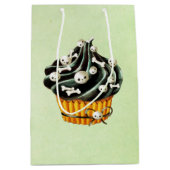 小さいスカルを搭載するハロウィンの黒いカップケーキ ミディアムペーパーバッグ (正面)