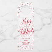 小さい星の渦巻形のな書道のメリークリスマス ボトルネックタグ (正面)