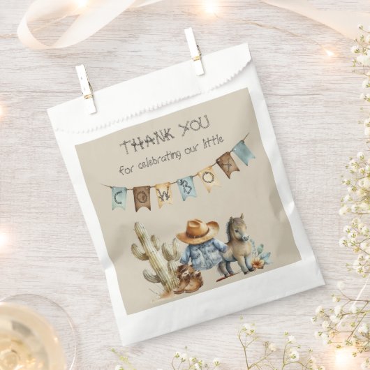 小さなカウボーイが赤ん坊のシャワーを浴びる フェイバーバッグ (クリップ留めされた状態)