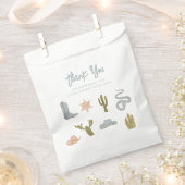 小さなカウボーイブルーベビーシャワー フェイバーバッグ (クリップ留めされた状態)