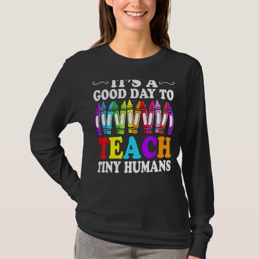 小さな人間の保育所教えの良い日 Tシャツ (正面)