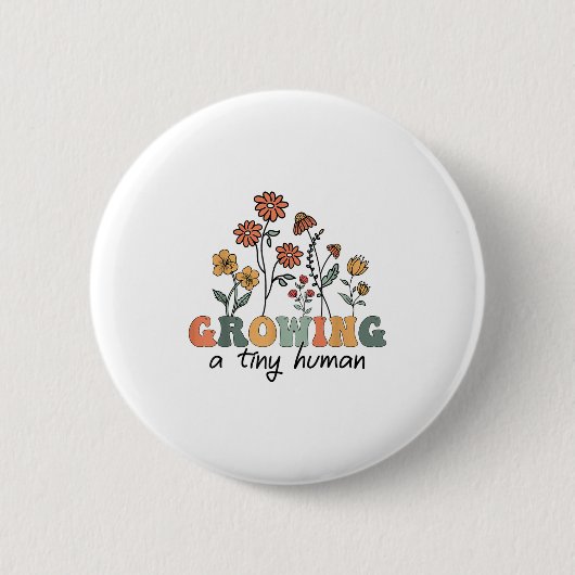 小さな人間を育てる 花柄の花 フラワーTシャツ 面白い 妊娠 缶バッジ (正面)