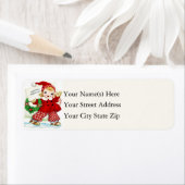 小さな女の子のスケート選手のクリスマスの挨拶のヴィンテージ ラベル (インサイチュ)