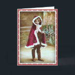 小さな女の子インChristmas Cape - Vintage Image シーズンカード<br><div class="desc">赤いクリスマスケープの中の小さな女の子のこの美しいヴィンテージのイメージでクリスマスの喜びを少し送る。ヴィンテージのクリスマス与えの画像が復元されて、フレーム…みんなメリークリスマス！</div>