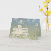 小さな女の子カイト付きベンチ カード (黄色い花)