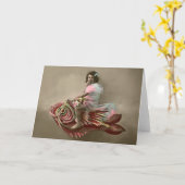 小さな女の子・ライディング・ア・フィッシュ カード (黄色い花)