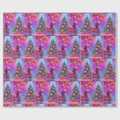 小さな女性のカーボーイがクリスマスの木の前に立っている ラッピングペーパー (フラット)