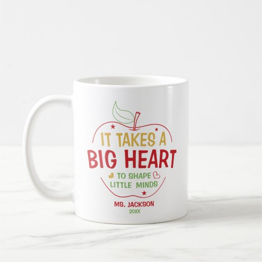 小さな心の形成には大きなハートを要する先生 コーヒーマグカップ (左)