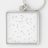 小さな点をたくさん持つ白い背景 キーホルダー (正面)