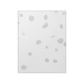 小さな点をたくさん持つ白い背景 ノートパッド (回転)