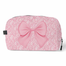 小さな白いとピンク離れのボウ付きパステルピンク