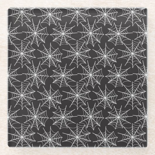 小さな白いハロウィーンのクモの巣が並ぶ黒 ガラスコースター (正面)