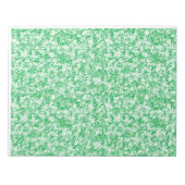 小さな白い点を持つ緑と白の背景 ノートパッド (正面)