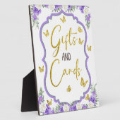 小さな蝶が途中のテーブルのプラーク フォトプラーク (側面)