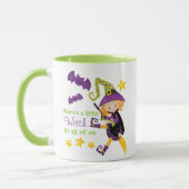 小さな魔女のハロウィーンがある マグカップ (左)