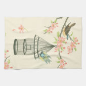 小さな鳥が枝に止まり鳥籠に止まる キッチンタオル (横)