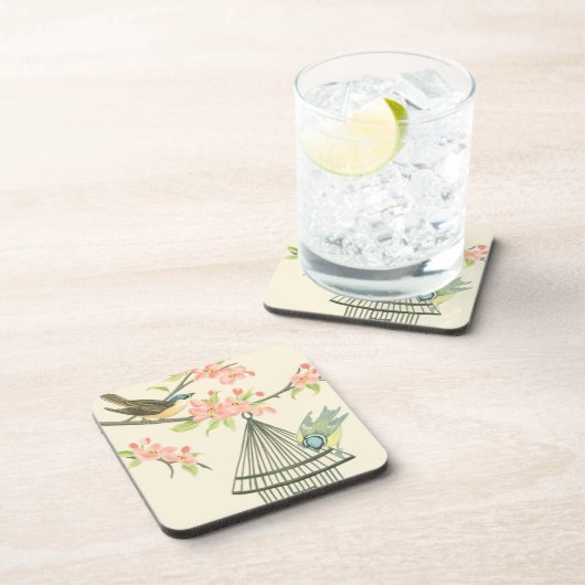 小さな鳥が枝に止まり鳥籠に止まる コースター (右側)